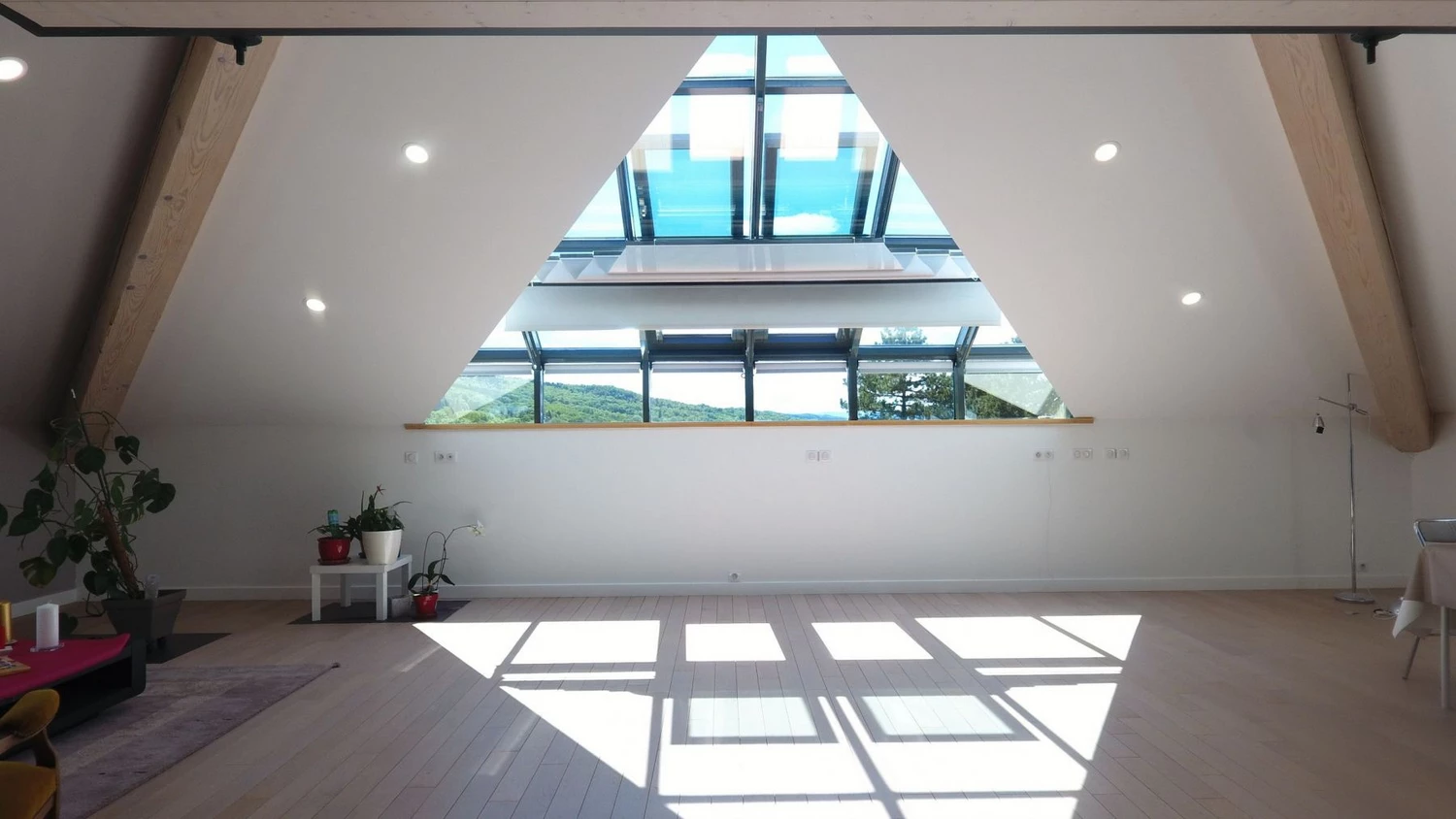 renovated attic with large roof window