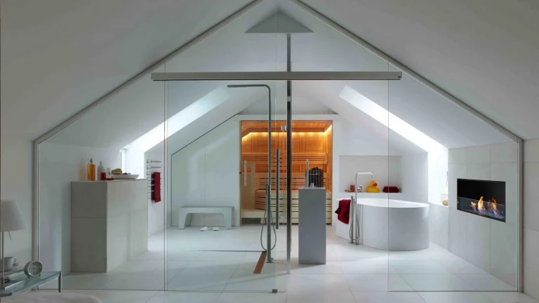 modern attic bathroom with large glass doors